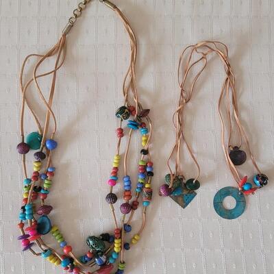 Lot 2: Vintage African Beads & Trinkets Necklace & (4) Leather Wrap Bracelets