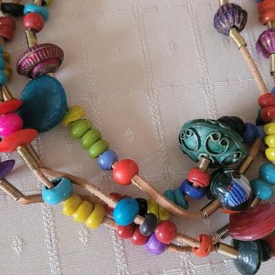 Lot 2: Vintage African Beads & Trinkets Necklace & (4) Leather Wrap Bracelets