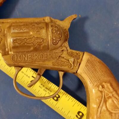 LOT 145  OLD LONE RIDER CAP GUN AND HOLSTER
