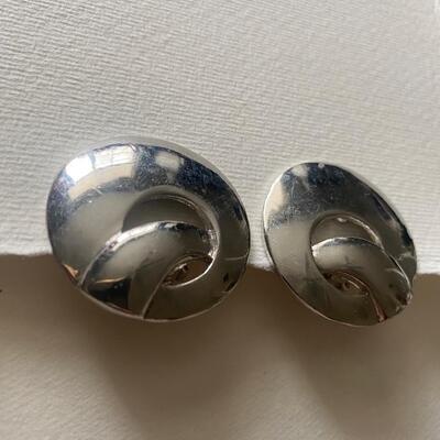 Two pair silver tone modern clip earrings