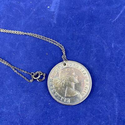 1953 Canadian one Dollar Coin on a necklace