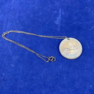 1953 Canadian one Dollar Coin on a necklace