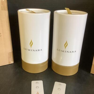 Lot 848. Pair of Luminara Faux-Flame Wax Pillar Candles - NEW - with Remotes