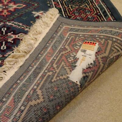 LOT 229. AREA RUG