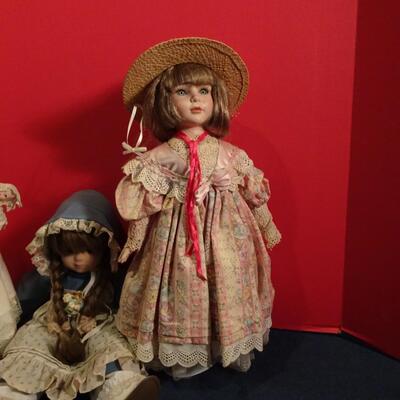 LOT 241. THREE VINTAGE DOLLS
