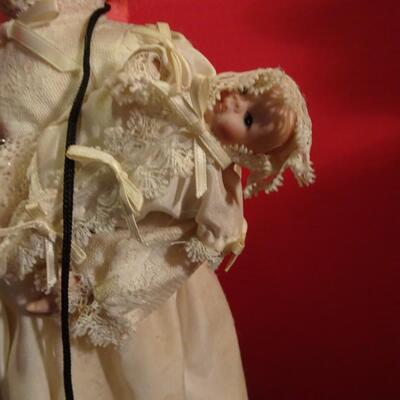 LOT 241. THREE VINTAGE DOLLS