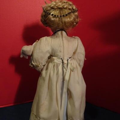 LOT 241. THREE VINTAGE DOLLS