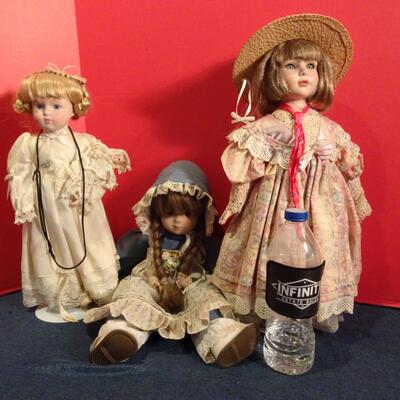LOT 241. THREE VINTAGE DOLLS
