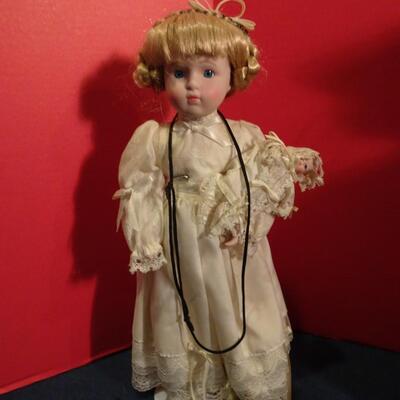 LOT 241. THREE VINTAGE DOLLS