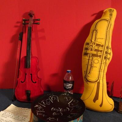 LOT 269. MUSIC RELATED HOME DECOR AND STEEL DRUM