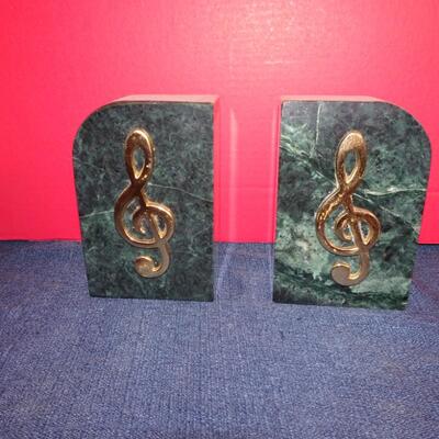 LOT 268. GRANITE MUSIC NOTE BOOKENDS