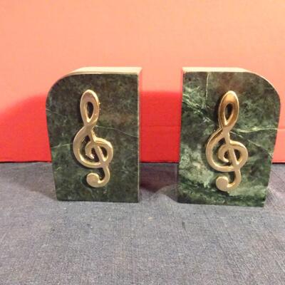 LOT 268. GRANITE MUSIC NOTE BOOKENDS