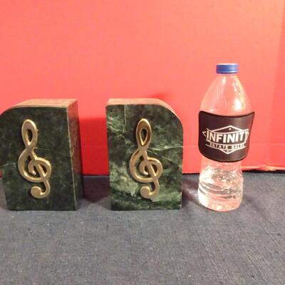 LOT 268. GRANITE MUSIC NOTE BOOKENDS