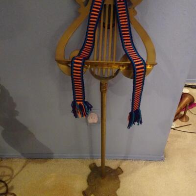 LOT 279. MUSIC RELATED HOME DECOR ITEMS MUSIC STAND