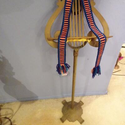 LOT 279. MUSIC RELATED HOME DECOR ITEMS MUSIC STAND