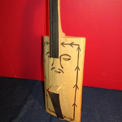 LOT 289. HAND CARVED VIOLIN