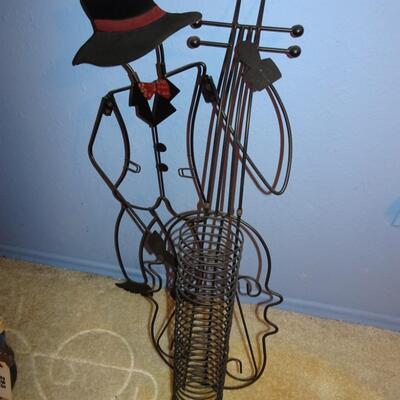 LOT 296. MUSICAL INSTRUMENT HOME DECOR METAL CD RACK