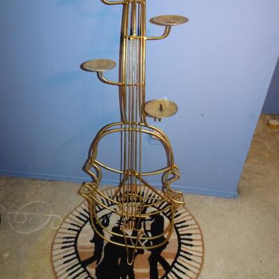 LOT 297 MUSICAL INSTRUMENT HOME DECOR CANDLE HOLDER 40" TALL AND RUG