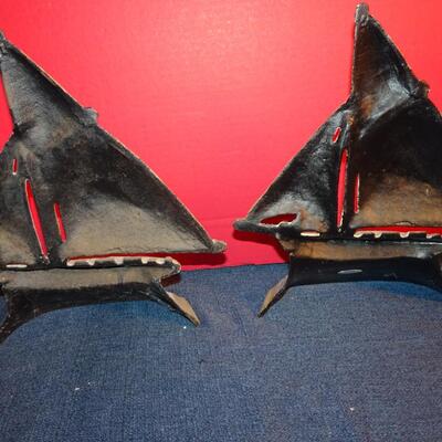 LOT 299. METAL SALE BOAT DOOR STOPS