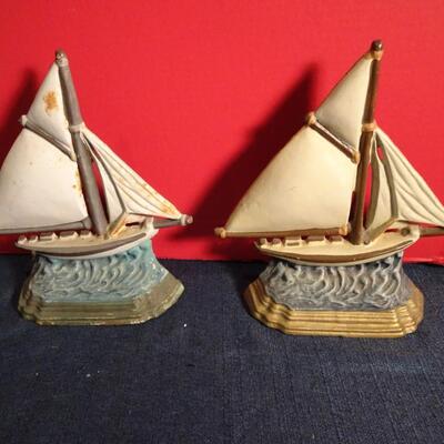 LOT 299. METAL SALE BOAT DOOR STOPS
