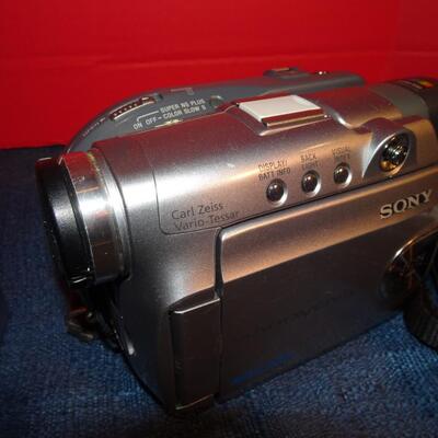 LOT 320. CAMERA AND VIDEO CAMERA