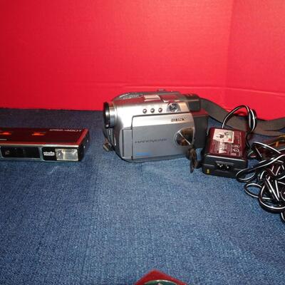 LOT 320. CAMERA AND VIDEO CAMERA