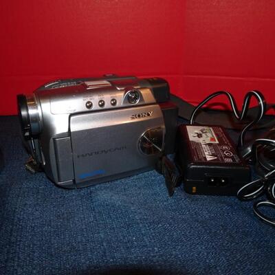 LOT 320. CAMERA AND VIDEO CAMERA