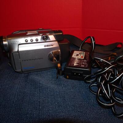 LOT 320. CAMERA AND VIDEO CAMERA