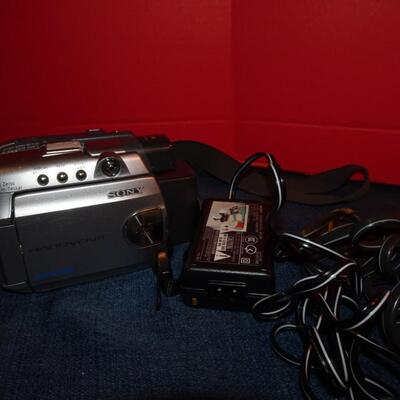 LOT 320. CAMERA AND VIDEO CAMERA