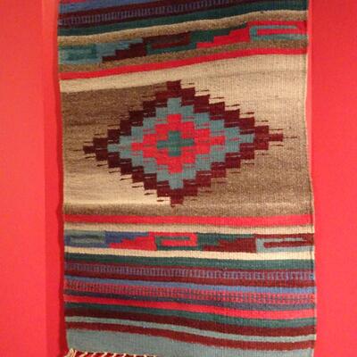 LOT 322. WOOL RUG