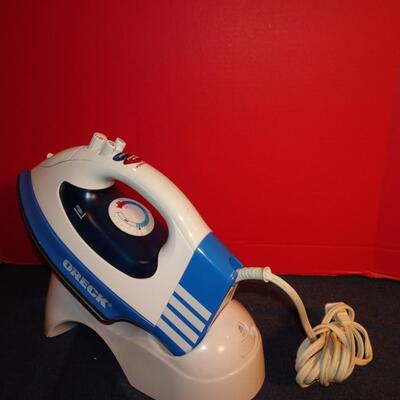 LOT 330. ORECK IRON AND STAND