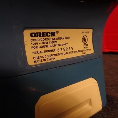 LOT 330. ORECK IRON AND STAND