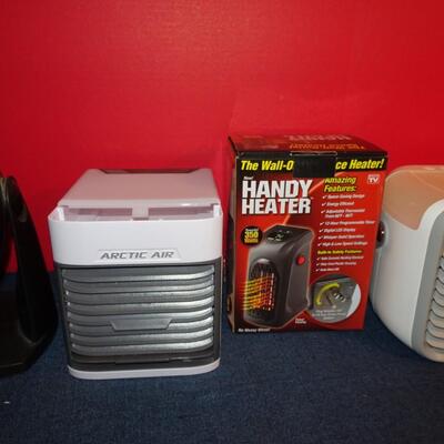 LOT 339. HEATERS AND FANS