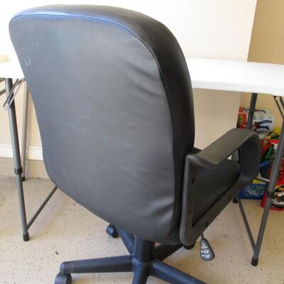 Black Office Chair on Wheels