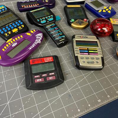 Large Lot of Hand Held Games 