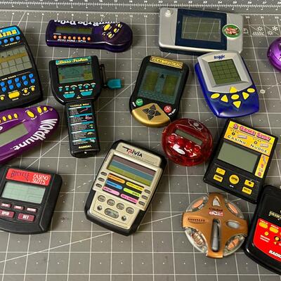 Large Lot of Hand Held Games 