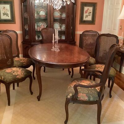 Dining room table, 6 caned chairs-2 are captains chairs