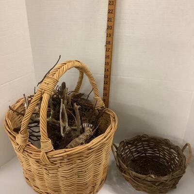 Lot  940. Basket filled with Sea Items & Natural Stick/Wood Basket