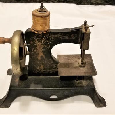Lot #107    Antique Child's Sewing Machine