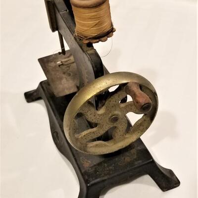 Lot #107    Antique Child's Sewing Machine