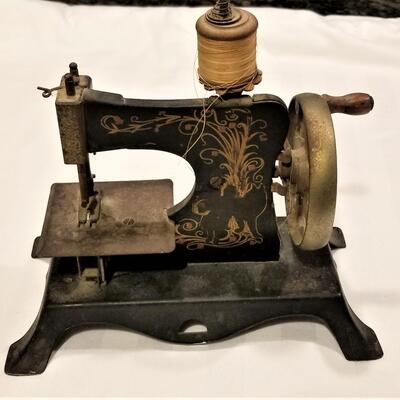 Lot #107    Antique Child's Sewing Machine