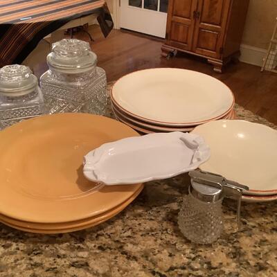 Glass canisters, butter dish, syrup dispenser