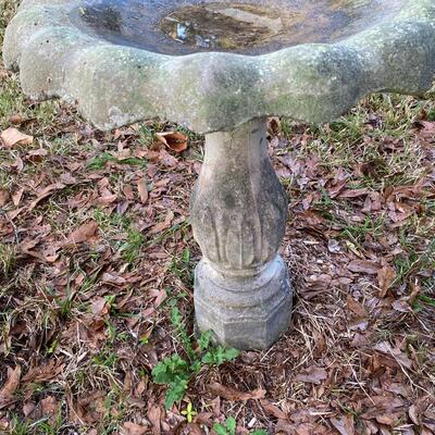 Vintage cement birdbath on pedestal