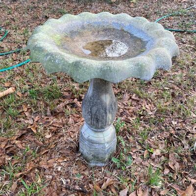 Vintage cement birdbath on pedestal