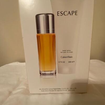 Calvin Klein Lot A: Escape eau de parfum spray and body lotion, NEW in box