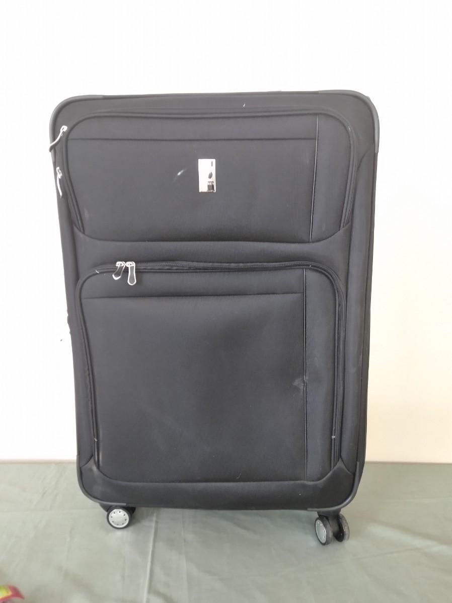 LOT 384 NEW DELSEY LIGHTWEIGHT SUITCASE WITH OVERWEIGHT INDICATOR