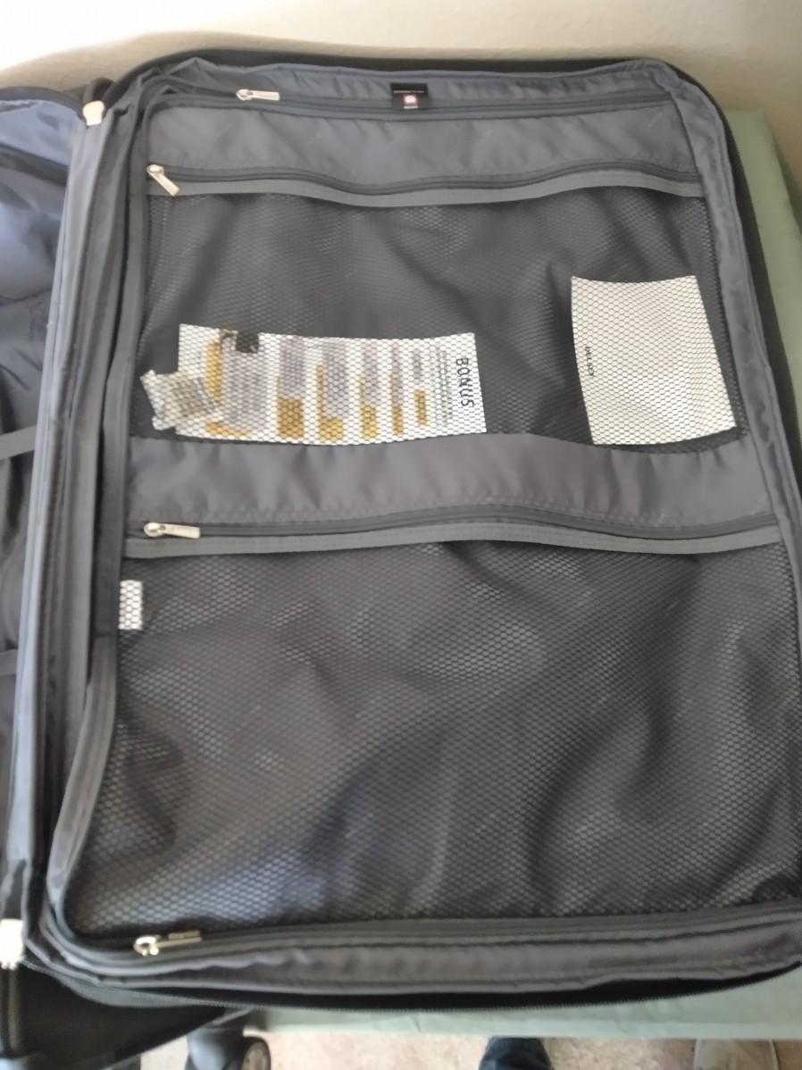 LOT 384 NEW DELSEY LIGHTWEIGHT SUITCASE WITH OVERWEIGHT INDICATOR