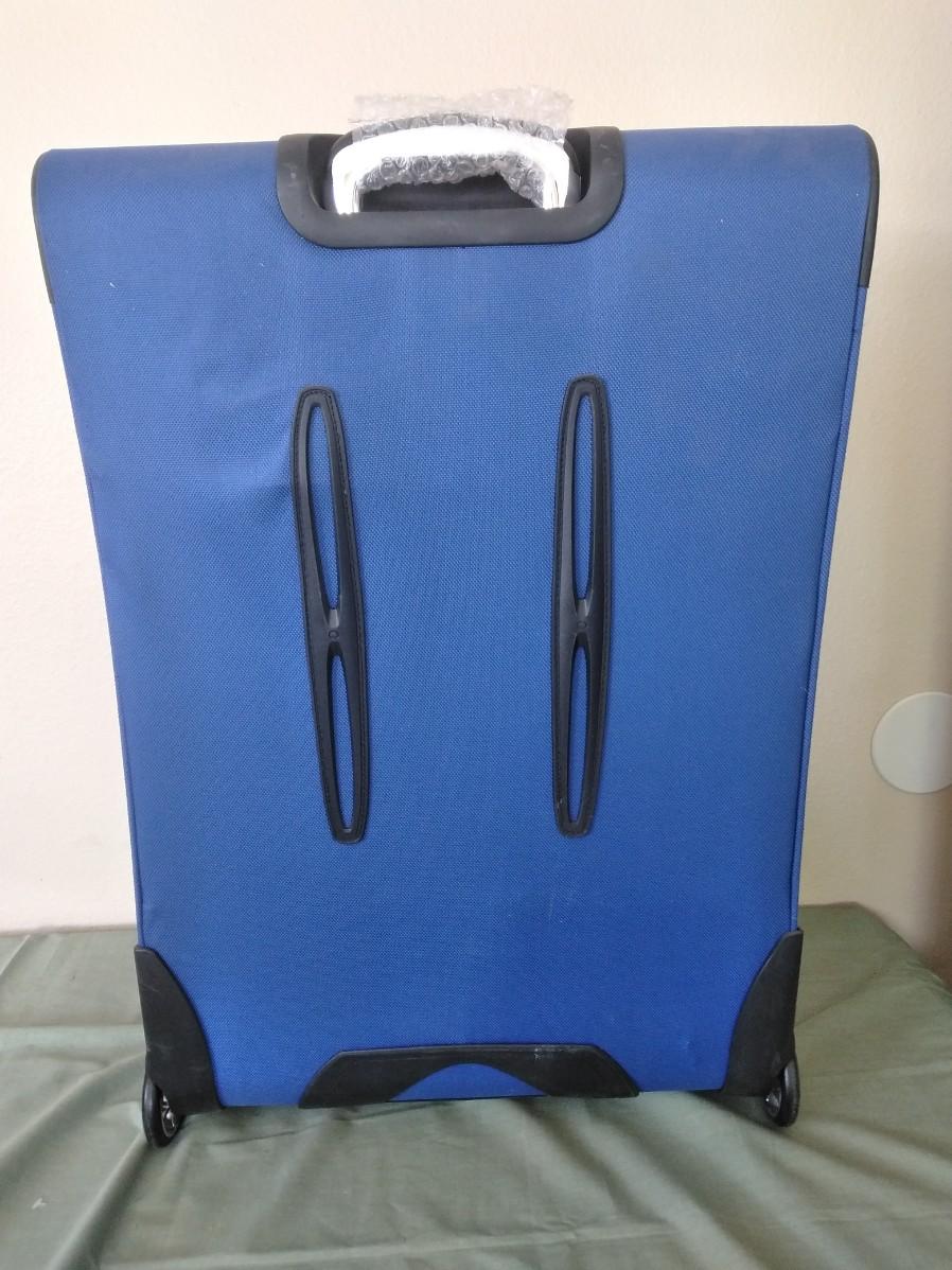 LOT 385 NEW DELSEY LIGHTWEIGHT SUITCASE WITH OVER WEIGHT INDICATOR