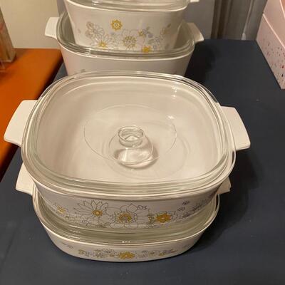 Set of four corning ware covered casserole dishes