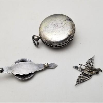 Lot #115  Vintage Jewelry Lot - Locket, Sterling Bird Brooch, Dime Brooch